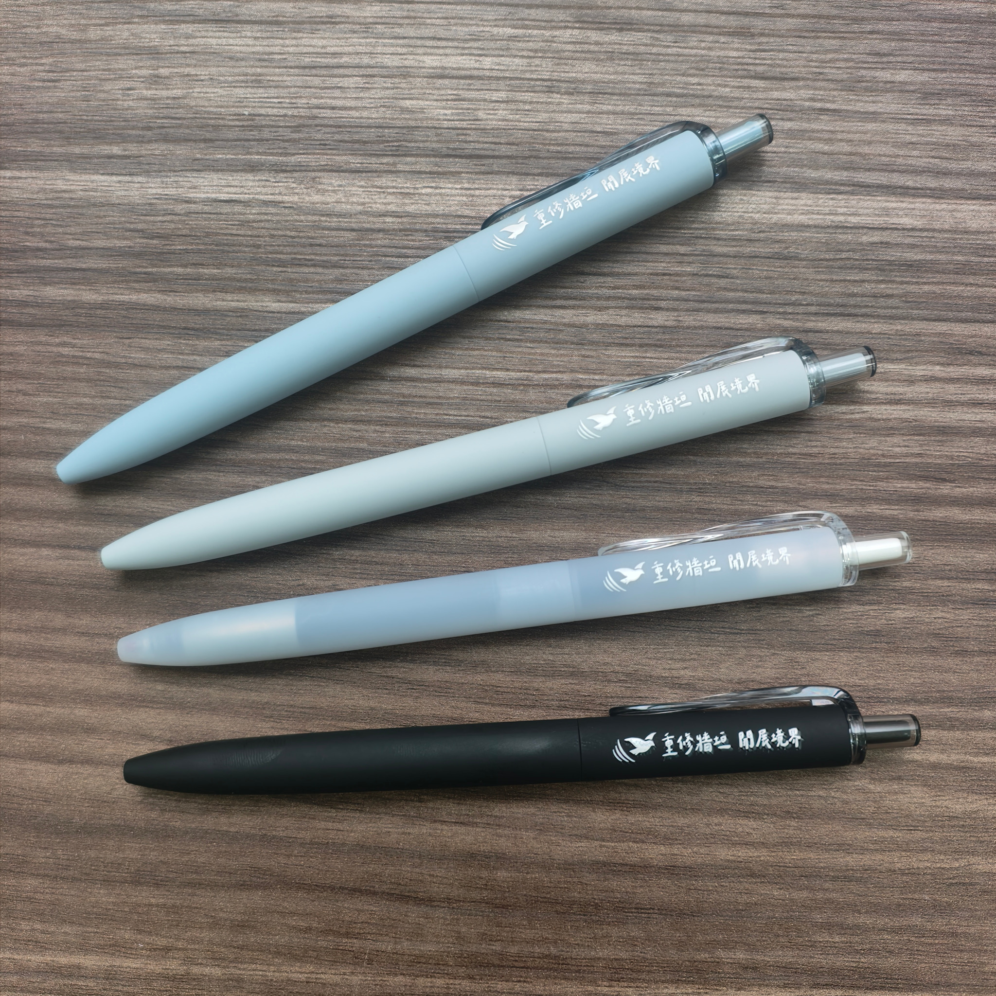 Centennial waterdrop rollerball pens in soft black, gray, blue and translucent finishes